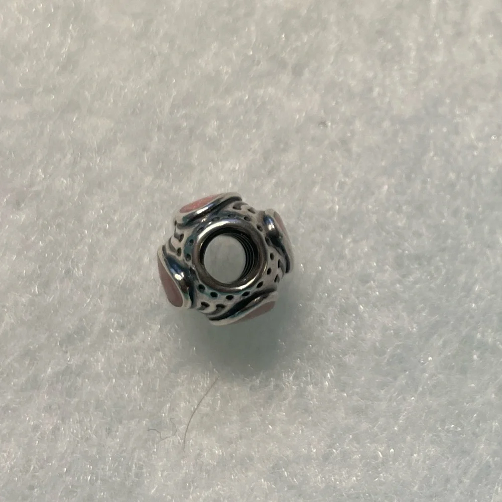 EUC Pandora Rose Enamel Hearts Charm Retired. In excellent condition.